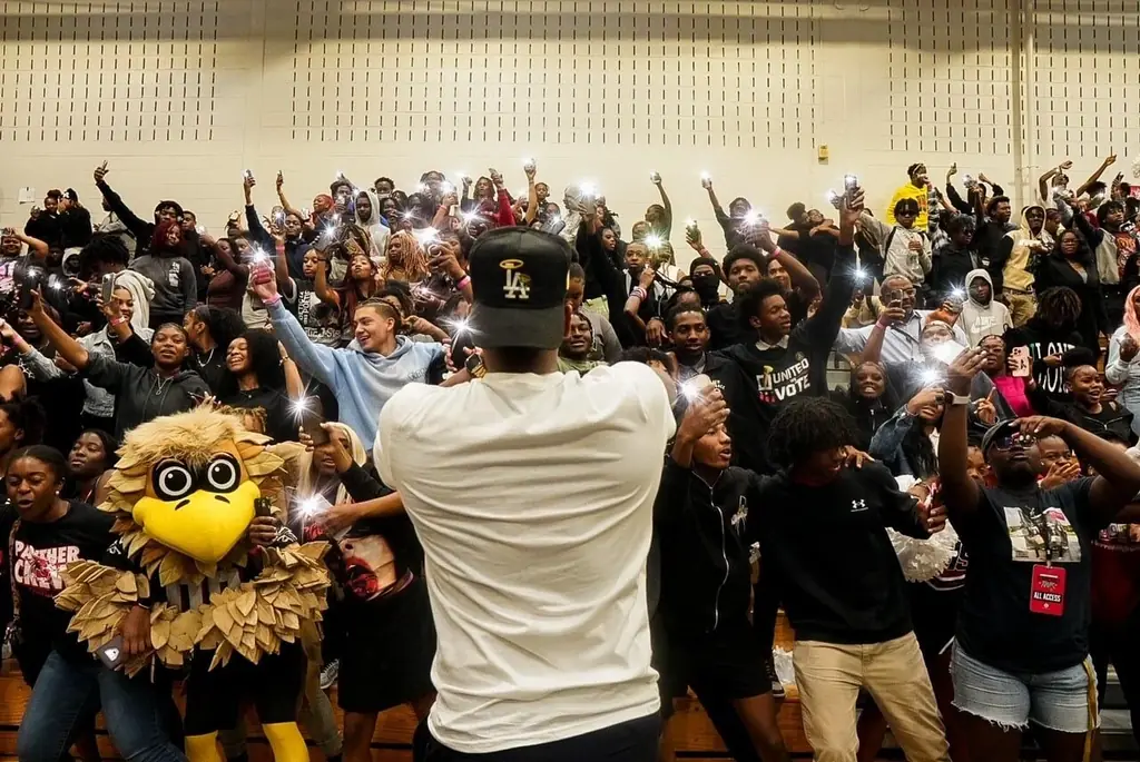 Gym full of students with phone lights up