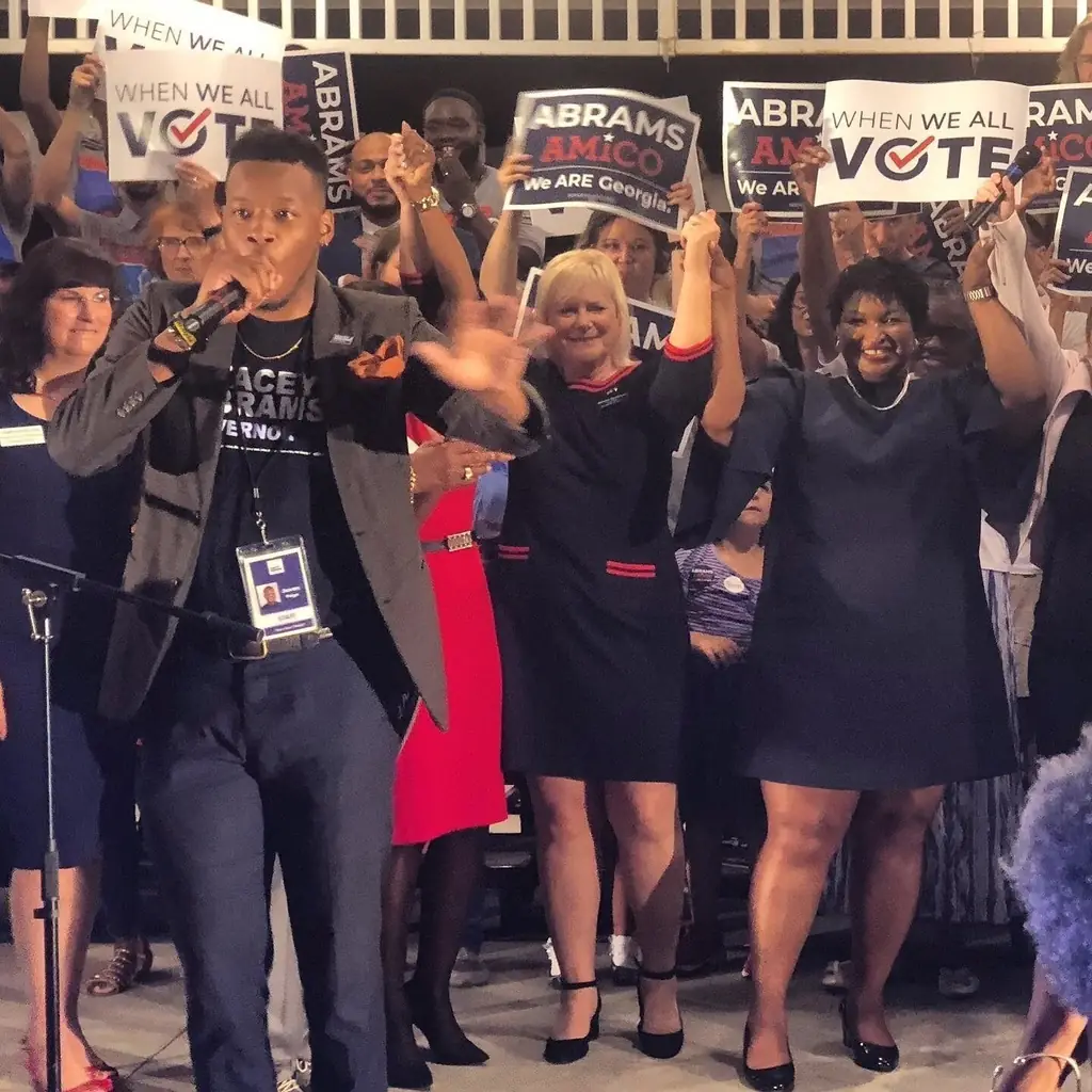 Jovan hosting a voting rally